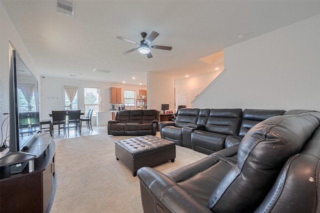 602 Willow Briar Dr, Houston, TX 77090 - living area with a ceiling fan, light colored carpet, and recessed lighting