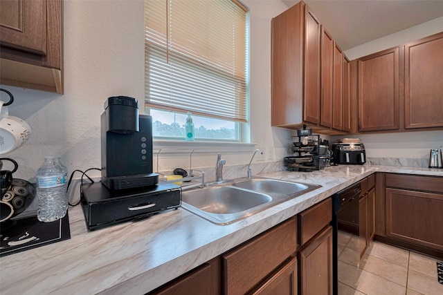 602 Willow Briar Dr, Houston, TX 77090 - kitchen with light countertops, black dishwasher, and light tile patterned floors