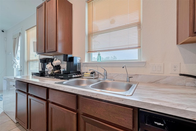 602 Willow Briar Dr, Houston, TX 77090 - kitchen featuring dishwasher, light countertops, and light tile patterned flooring