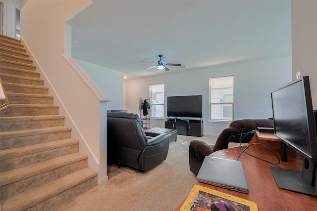 602 Willow Briar Dr, Houston, TX 77090 - carpeted living area featuring stairs and ceiling fan