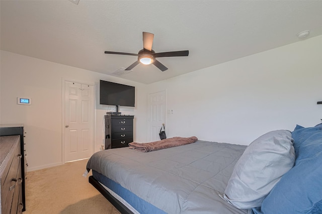 602 Willow Briar Dr, Houston, TX 77090 - bedroom featuring light colored carpet and a ceiling fan