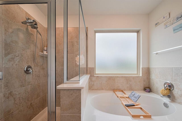 602 Willow Briar Dr, Houston, TX 77090 - bathroom featuring a garden tub and a shower stall
