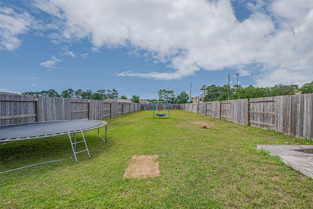 602 Willow Briar Dr, Houston, TX 77090 - fenced backyard featuring a trampoline