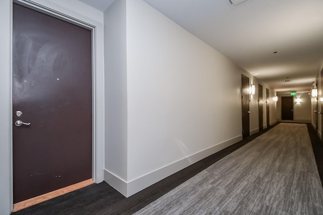 5005 Hidalgo St Unit 210, Houston, TX 77056 - corridor with dark wood-type flooring and baseboards
