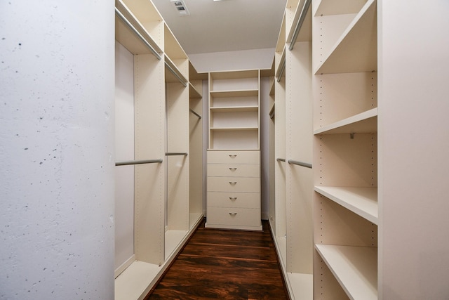 5005 Hidalgo St Unit 210, Houston, TX 77056 - walk in closet with dark wood-style flooring