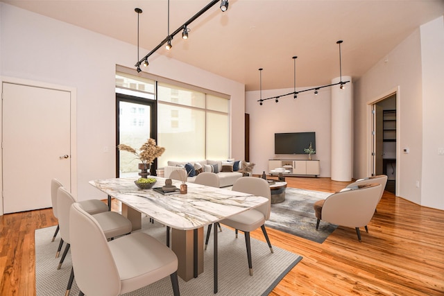 5005 Hidalgo St Unit 210, Houston, TX 77056 - dining area with light wood finished floors