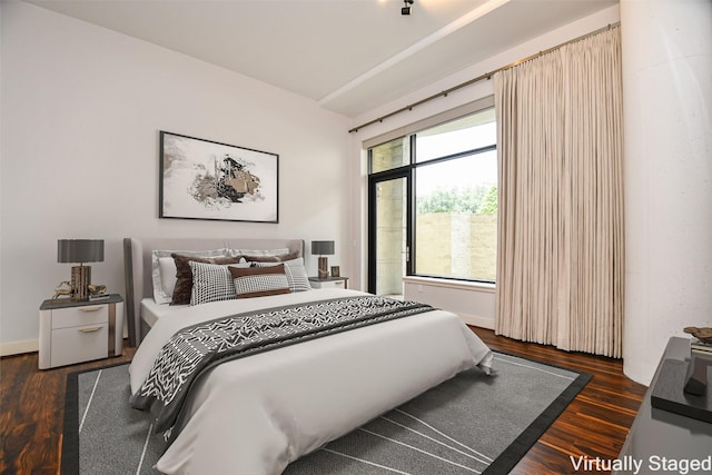 5005 Hidalgo St Unit 210, Houston, TX 77056 - bedroom with dark wood-style flooring