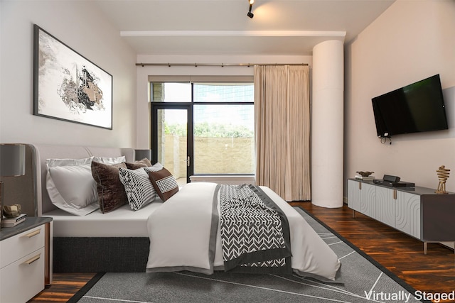 5005 Hidalgo St Unit 210, Houston, TX 77056 - bedroom featuring dark wood-style flooring
