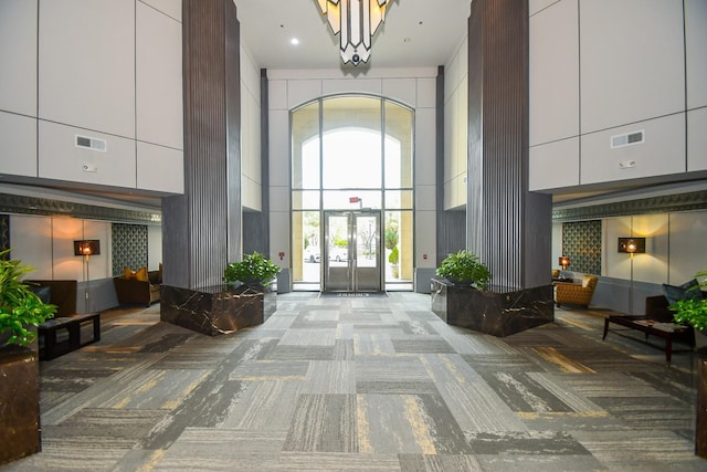 5005 Hidalgo St Unit 210, Houston, TX 77056 - common area featuring a towering ceiling