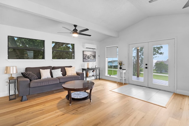 110 Lakeview Shores Dr, Coldspring, TX 77331 - living room with ceiling fan, vaulted ceiling, wood finished floors, french doors, and a wall mounted air conditioner