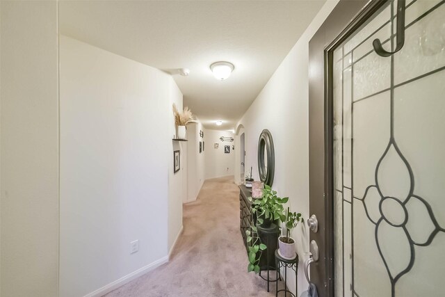 21118 Baltic Rain Dr, Hockley, TX 77447 - hallway featuring light carpet