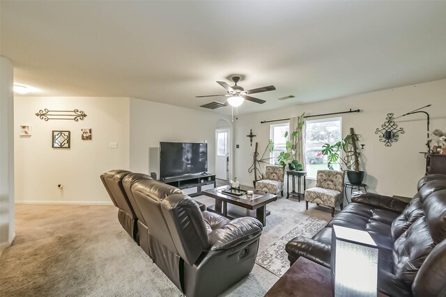 21118 Baltic Rain Dr, Hockley, TX 77447 - living area featuring light carpet and a ceiling fan