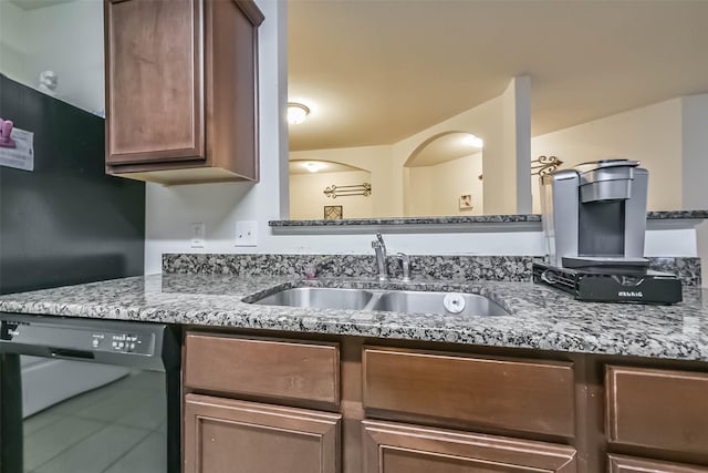 21118 Baltic Rain Dr, Hockley, TX 77447 - kitchen with black dishwasher and light stone counters