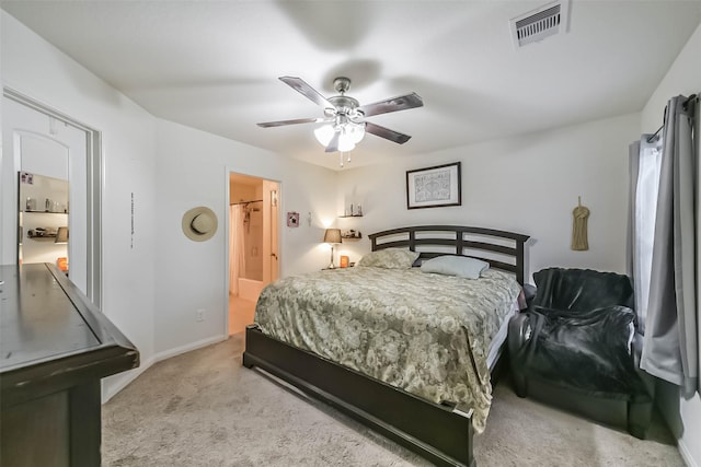 21118 Baltic Rain Dr, Hockley, TX 77447 - bedroom featuring light carpet, ceiling fan, and connected bathroom