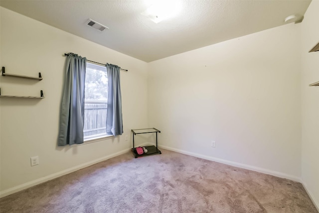 21118 Baltic Rain Dr, Hockley, TX 77447 - empty room with carpet floors and a smoke detector
