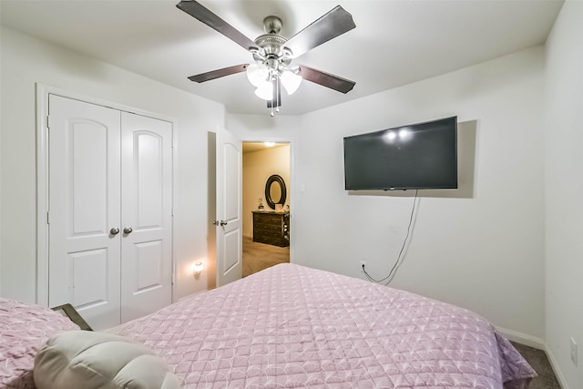 21118 Baltic Rain Dr, Hockley, TX 77447 - carpeted bedroom with a closet and a ceiling fan