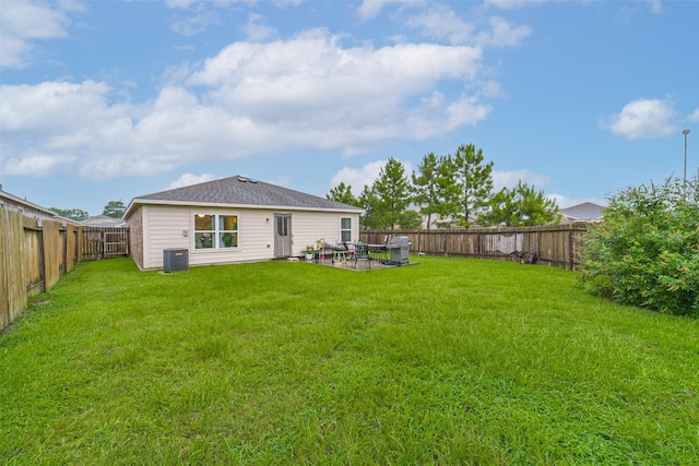 21118 Baltic Rain Dr, Hockley, TX 77447 - rear view of property featuring a fenced backyard and a patio area