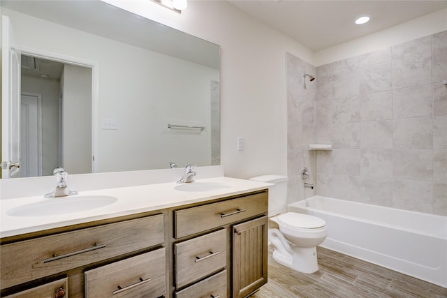 3905 Chartham Ln, Pearland, TX 77584 - full bathroom featuring double vanity, wood finished floors, and shower / tub combination