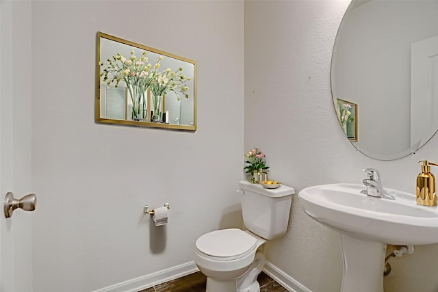 3905 Chartham Ln, Pearland, TX 77584 - bathroom featuring toilet and wood finished floors
