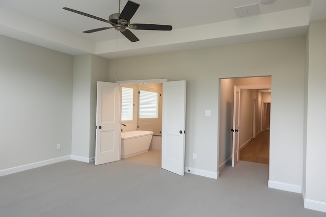 2519 S Houston Ave, Pearland, TX 77581 - unfurnished bedroom featuring carpet floors, ensuite bathroom, and ceiling fan