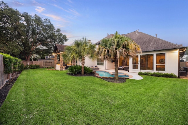 5214 Bristol Bank Ct, Houston, TX 77041 - rear view of property featuring roof with shingles, a patio area, a fenced backyard, stucco siding, and an outdoor hangout area