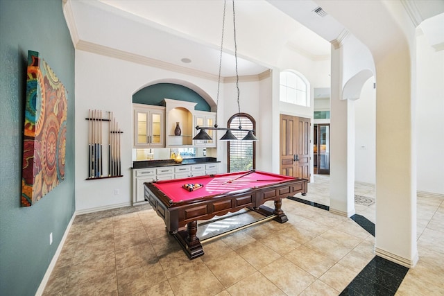 5214 Bristol Bank Ct, Houston, TX 77041 - rec room with ornamental molding, pool table, light tile patterned floors, arched walkways, and a high ceiling