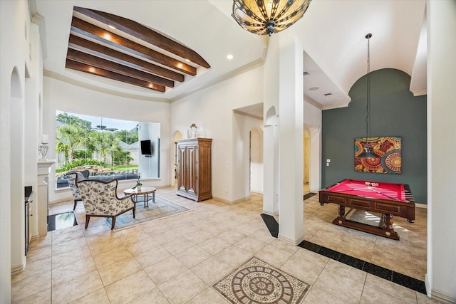 5214 Bristol Bank Ct, Houston, TX 77041 - tiled foyer entrance with billiards table, arched walkways, beamed ceiling, a chandelier, and a high ceiling