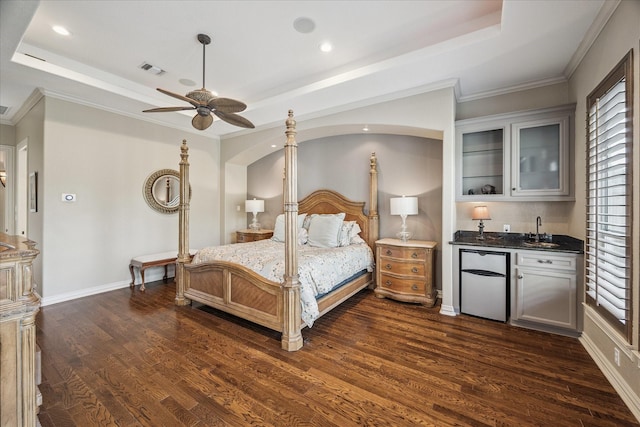 5214 Bristol Bank Ct, Houston, TX 77041 - bedroom with bar with sink, a raised ceiling, refrigerator, recessed lighting, and dark wood finished floors