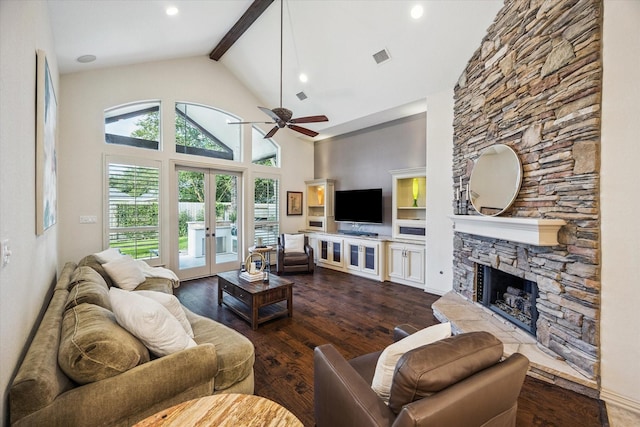 5214 Bristol Bank Ct, Houston, TX 77041 - living room featuring beam ceiling, french doors, wood finished floors, a ceiling fan, and a fireplace
