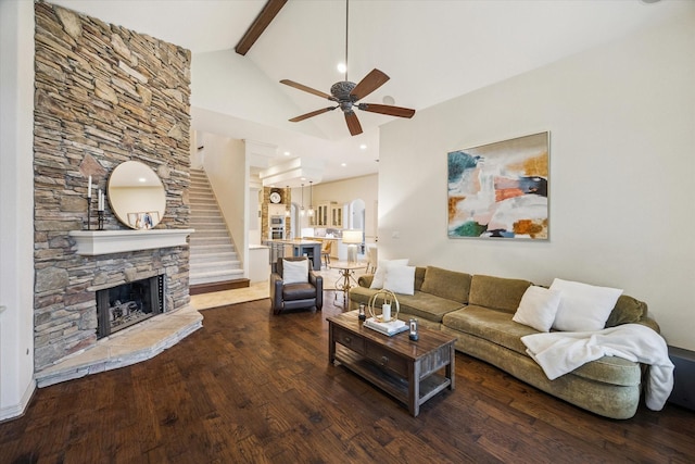5214 Bristol Bank Ct, Houston, TX 77041 - living room featuring wood finished floors, a fireplace, beam ceiling, ceiling fan, and high vaulted ceiling