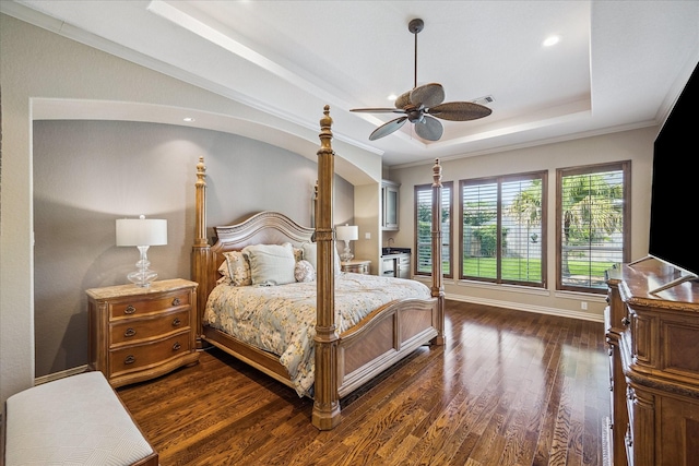5214 Bristol Bank Ct, Houston, TX 77041 - bedroom featuring dark wood finished floors, a raised ceiling, ornamental molding, and a ceiling fan