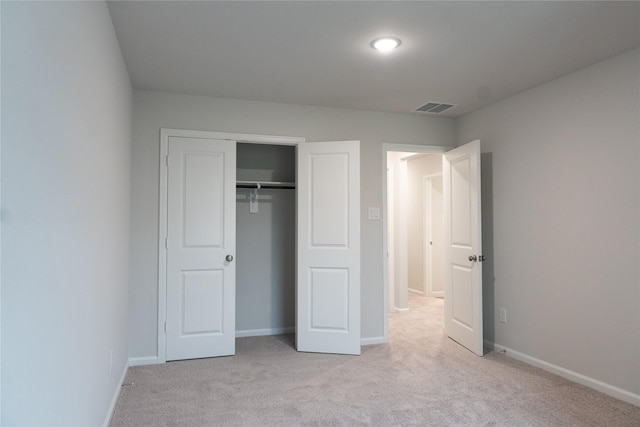 64 Valiant Ridge Trl, Magnolia, TX 77354 - unfurnished bedroom with light carpet and a closet