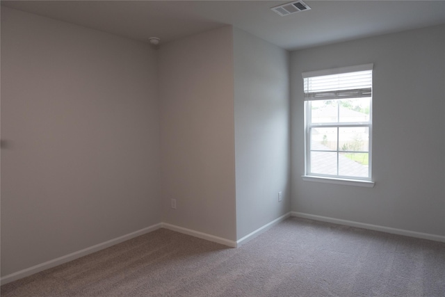 64 Valiant Ridge Trl, Magnolia, TX 77354 - empty room featuring light colored carpet and baseboards