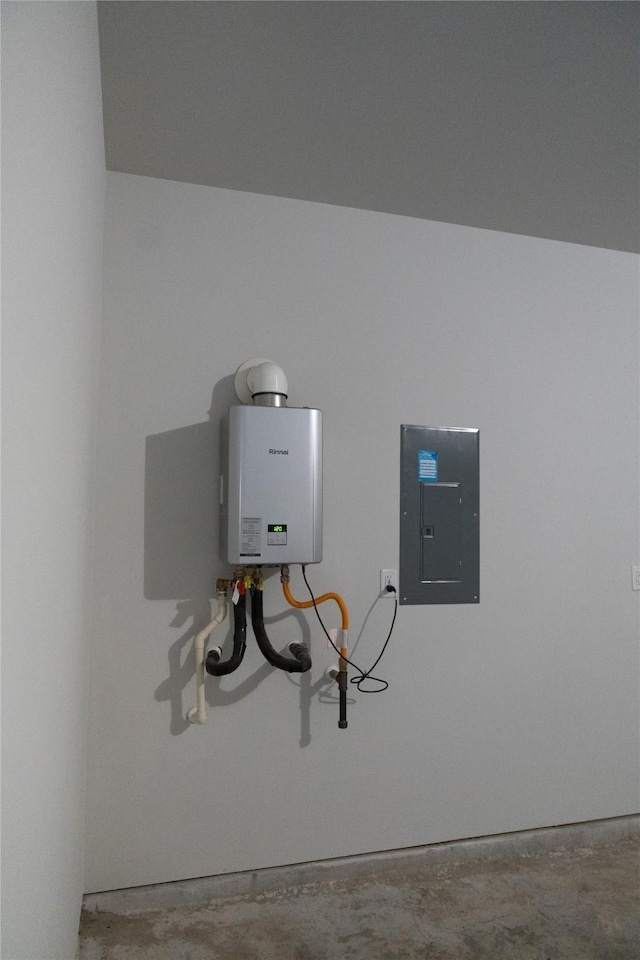 64 Valiant Ridge Trl, Magnolia, TX 77354 - detailed view of electric panel, concrete floors, and tankless water heater