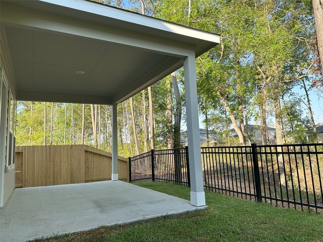 64 Valiant Ridge Trl, Magnolia, TX 77354 - fenced backyard featuring a patio