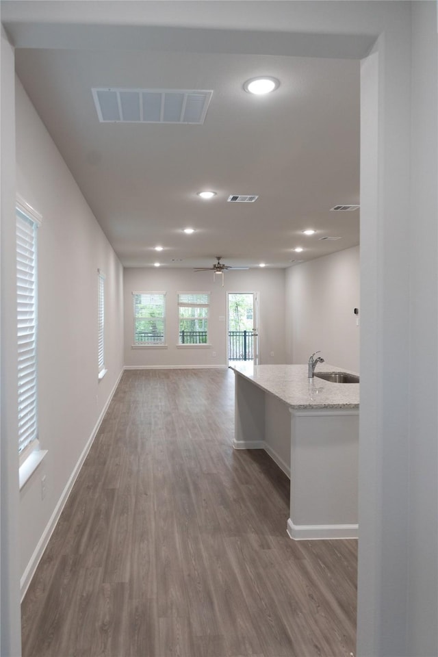64 Valiant Ridge Trl, Magnolia, TX 77354 - empty room with dark wood-type flooring, recessed lighting, and a ceiling fan