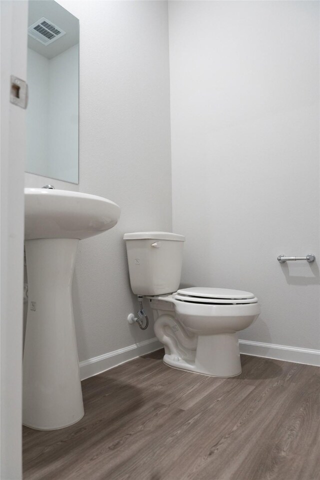 64 Valiant Ridge Trl, Magnolia, TX 77354 - bathroom with wood finished floors