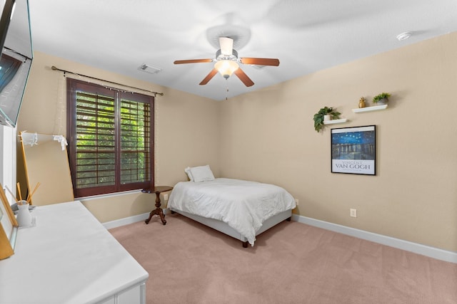 4022 Hidden Winds Dr, Spring, TX 77386 - bedroom featuring light colored carpet and ceiling fan