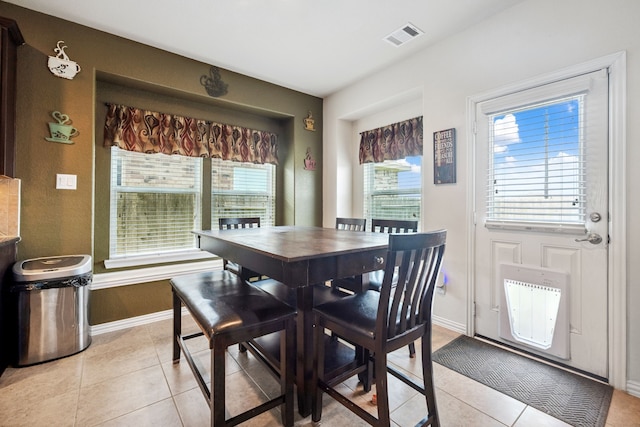 7910 Brooks Crossing Dr, Baytown, TX 77521 - dining room featuring light tile patterned floors