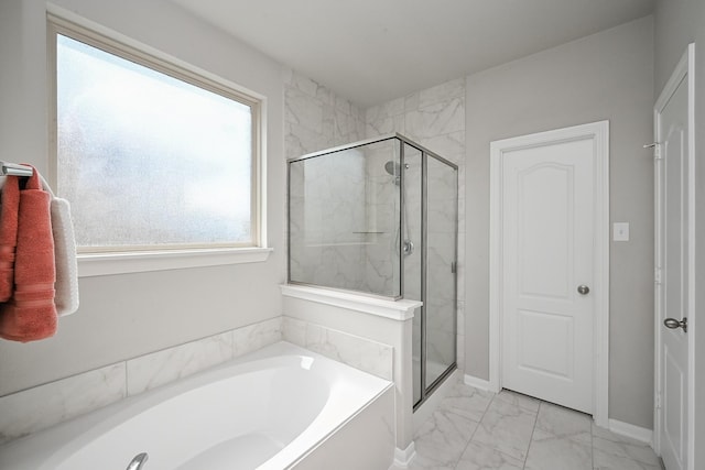 25915 Native Sapphire Ct, Richmond, TX 77406 - bathroom featuring marble finish floors, a bath, and a shower stall