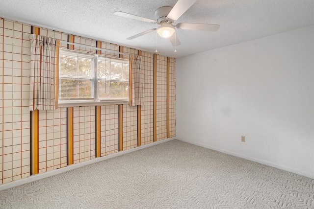 2718 Stratford St, Pearland, TX 77581 - spare room featuring carpet floors, a ceiling fan, and a textured ceiling