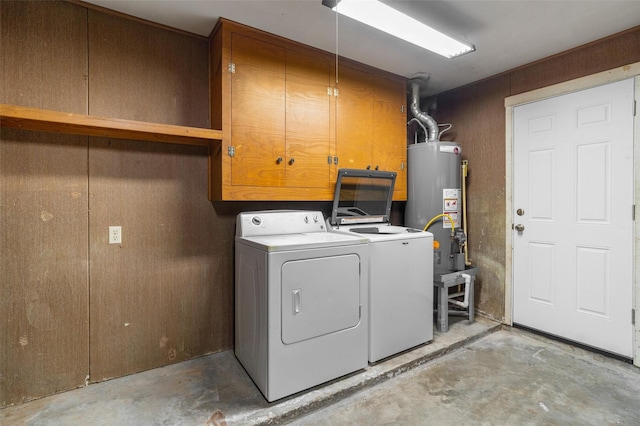 2718 Stratford St, Pearland, TX 77581 - washroom with cabinet space, gas water heater, and washer and dryer