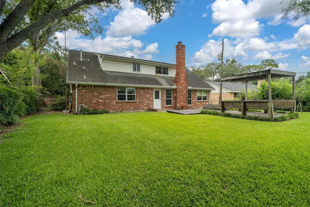 2718 Stratford St, Pearland, TX 77581 - rear view of property with a chimney, brick siding, a lawn, and a shingled roof