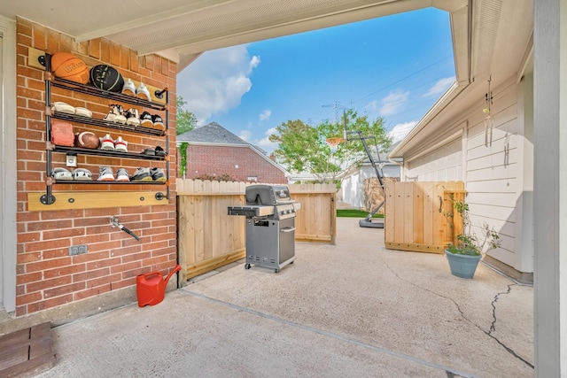 4106 Alice Dr, Sugar Land, TX 77478 - view of patio / terrace featuring a grill
