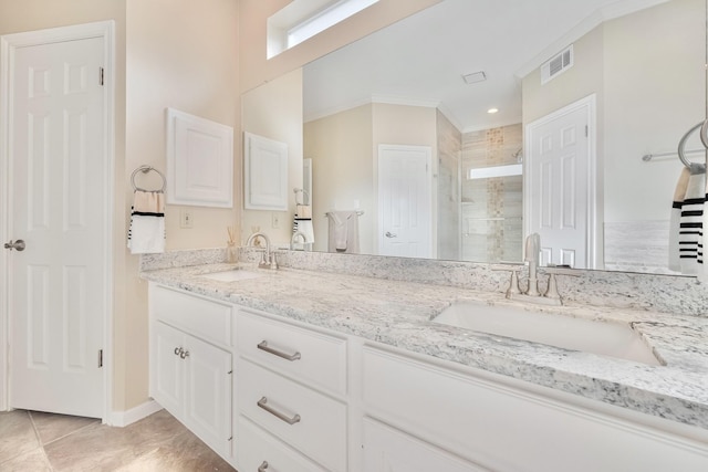4106 Alice Dr, Sugar Land, TX 77478 - full bathroom with a stall shower, double vanity, crown molding, and tile patterned floors