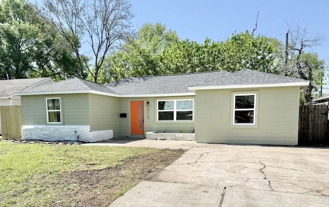 2110 Garvey Dr, Pasadena, TX 77506 - single story home featuring a shingled roof, stone siding, a patio, and driveway