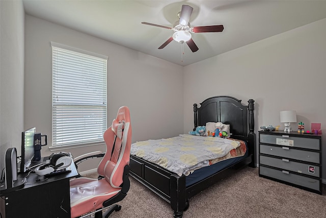 9198 Sierra Del Carmen, Conroe, TX 77303 - carpeted bedroom with a desk and ceiling fan