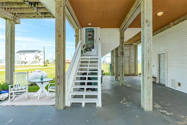 18614 Warrior Rd, Galveston, TX 77554 - view of patio featuring stairway