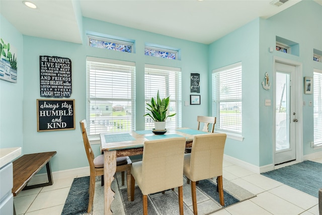 18614 Warrior Rd, Galveston, TX 77554 - dining space featuring light tile patterned flooring