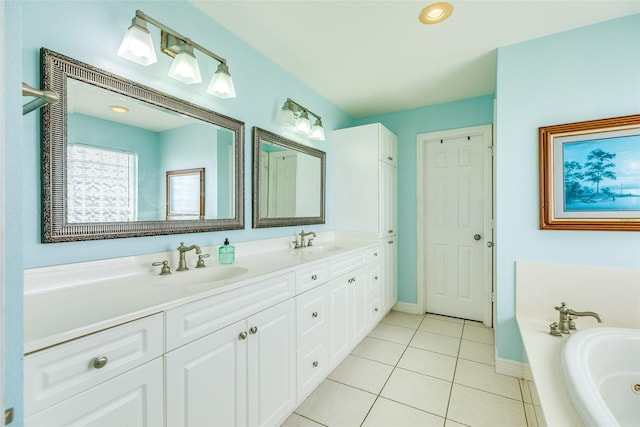18614 Warrior Rd, Galveston, TX 77554 - full bathroom with double vanity, a bath, and tile patterned flooring